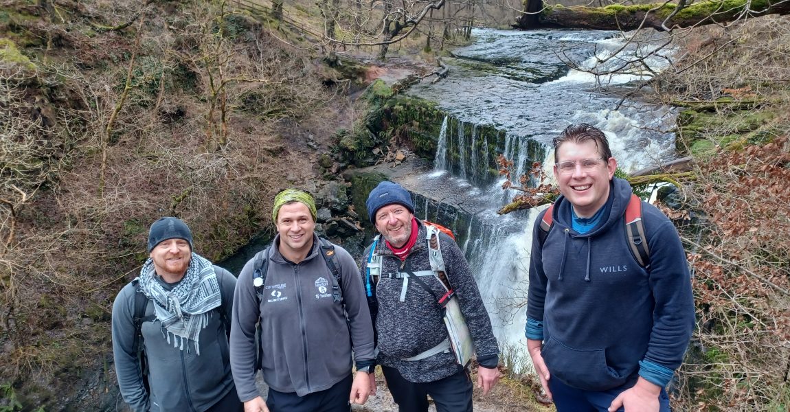Four Men Walk Waterfalls